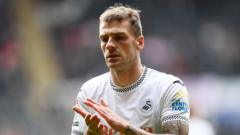 Swansea's Tymon targeting Premier League return