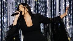 Israel qualifies for Eurovision final amid protests