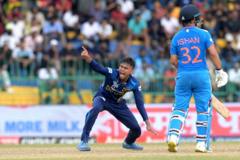 Sri Lanka's Dunith Wellalage (L) unsuccessfully appeals for leg before wicket (LBW) against India's Hardik Pandya (not pictured) during the Asia Cup 2023 Super Four one-day international (ODI) cricket match between India and Sri Lanka at the R. Premadasa Stadium in Colombo on September 12, 2023