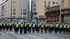 Riot police deal with 'serious disorder' as Celtic fans celebrate Premiership title win