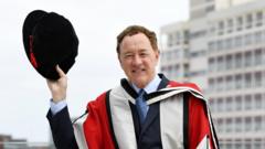 Football club owner handed honorary degree