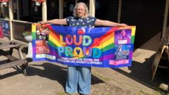 Pride event cancelled after banners torn down