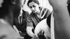 Photo series documents life on busy London maternity ward