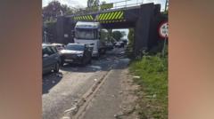 Trains delayed as 'most bashed bridge' hit again