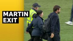 Martin leaves Falkirk separately as fans delay Rangers bus