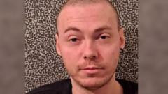 Police hunt for 'dangerous' grandson of woman murdered in street