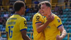 Cymru Premier: Barry maintain perfect start with late win