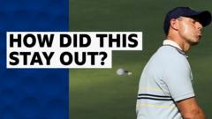 McIlroy putt circles the hole