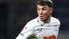 Preston sign Devine from Spurs for club-record fee