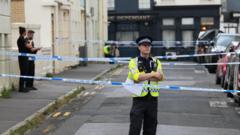 Two injured as knifeman threatens people in street