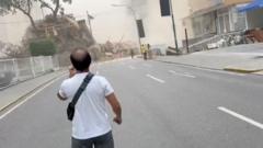 Collapsed buildings in Caracas after quake