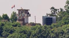 N Korea denies removing propaganda loudspeakers at border