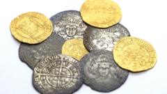 Metal detectorists unearth 15th Century coin hoard