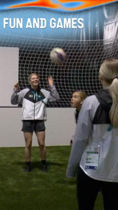 Ice hockey players keep warm before taking to the ice