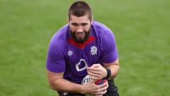 Hill replaces injured Martin on England bench