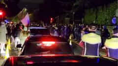 Police attacked at protest outside asylum seeker hotel