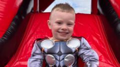 'Inspirational' boy who lost both legs celebrated as a 'superhero'