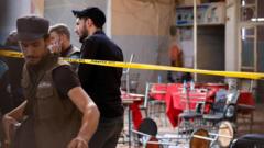 Bomb blast at Damascus cafe kills six, Syrian state media say