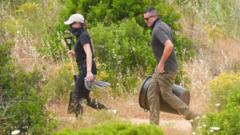 Madeleine search officers dig at abandoned building on day one