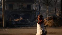 Two dead and hundreds evacuated after twin fires break out on Greek island