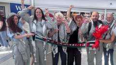 Seven flotilla activists detained in Israel arrive back in UK