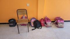 School bags and a chair in a school