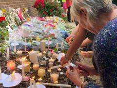 Crowds attend vigil for 80-year-old attack victim