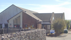 Two injured as car rams into GP practice