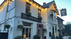 Man killed next to pub was stabbed, police say