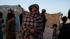 Afghan whose details were in UK data breach at risk from Taliban if deported, son tells BBC
