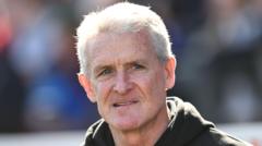 Hughes to stay as Carlisle boss in National League