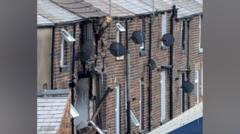 Two injured and dozens evacuated in house explosion