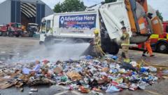 Bin lorry damaged after battery starts fire