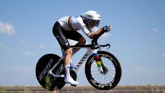 Reusser takes Tour lead with time trial win