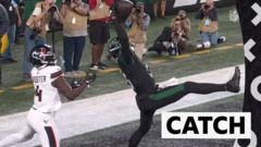 Jets star Wilson makes stunning one-handed touchdown catch