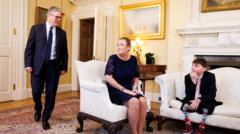 Boy, 11, meets PM after child cruelty register win