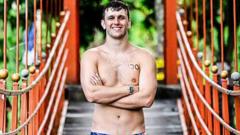 Ex-high diving world champ Heslop returns after back surgery