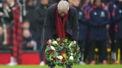 Man Utd pay emotional Old Trafford tribute to Law