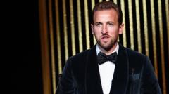 Kane shares Ballon d'Or top scorer award with absent Mbappe