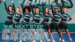 The Next Step Cheer logo in front of a troupe of cheerleaders in black and blue uniforms
