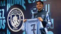 Man City sign Frankfurt forward Marmoush for £59m