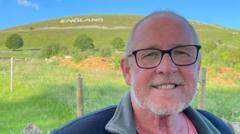 Village's huge England message seen from the sky