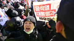 Why has it been so hard to arrest S Korea's impeached president?