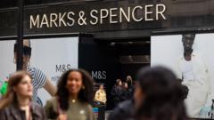 M&S profits halved after cyber-attack