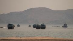 US-Iran talks to begin in Switzerland as Tehran says it closed Strait of Hormuz