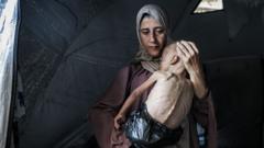 The story behind the photograph of a starving Gaza baby