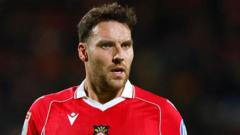 Midfielder James signs new Wrexham contract