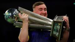 Littler masterclass seals back-to-back world darts titles