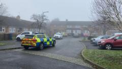 Woman arrested over Christmas Day village murder