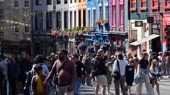 Scotland's public spending deficit falls as tax take rises